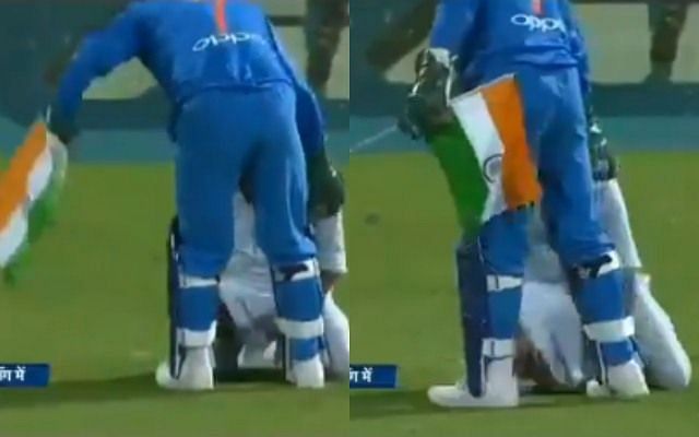 MS Dhoni prevents the Indian flag from touching the ground
